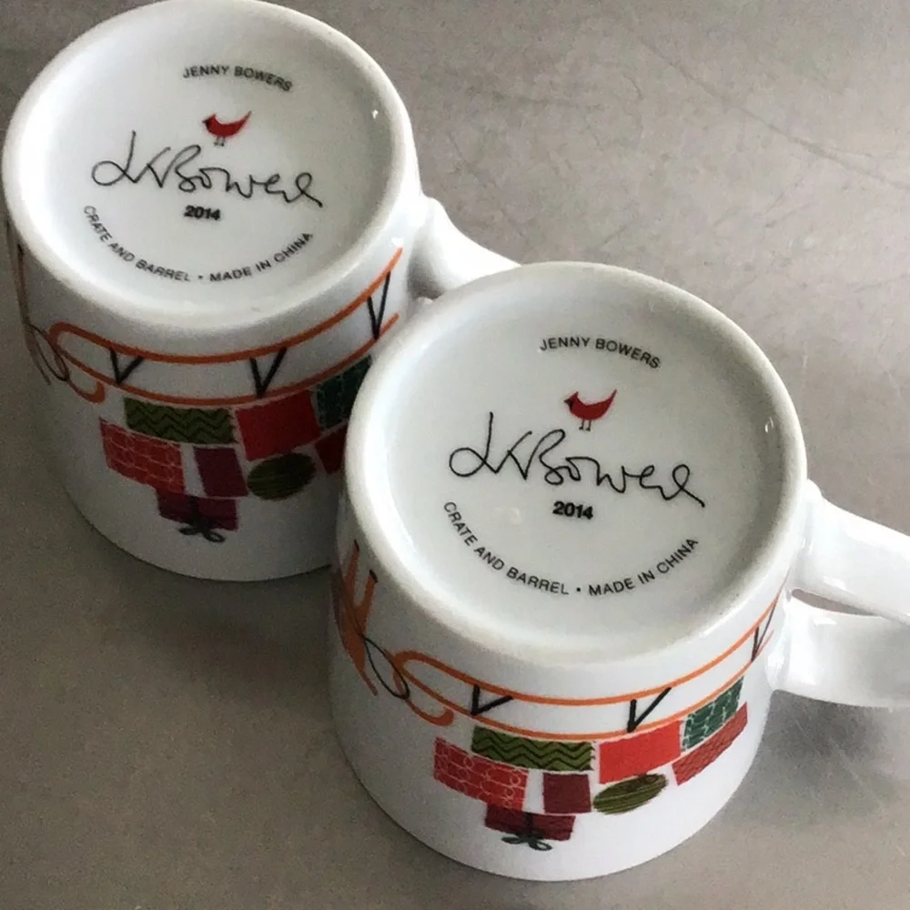 Two Crate & Barrel 6oz. Reindeer and sleigh mugs by Jenny Bowers.